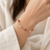 Clover Garden Bracelet — wearing illustration