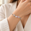 Butterfly Rose Bracelet — wearing illustration