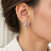 Starlight Huggie Hoops — wearing illustration