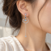 Moon and Star Drop Earrings — wearing illustration