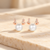 Little Dragon Pearl Studs — styled display