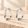 Soft Triangle Hoop Earrings — styled display