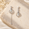 Moon and Star Drop Earrings — styled display