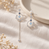 Moon and Star Drop Earrings — editorial setting