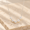Pearl Rhythm Necklace — styled display