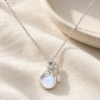 Fortune Pouch Necklace — editorial setting