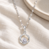 Mobius Spark Necklace — editorial setting